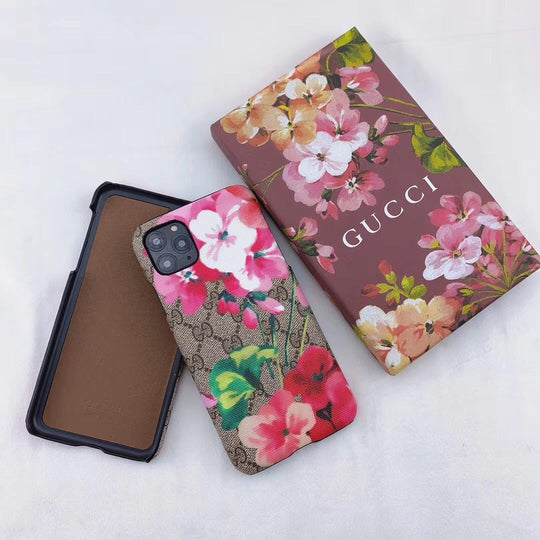 Stylish Gucci phone case with iconic blooms pattern