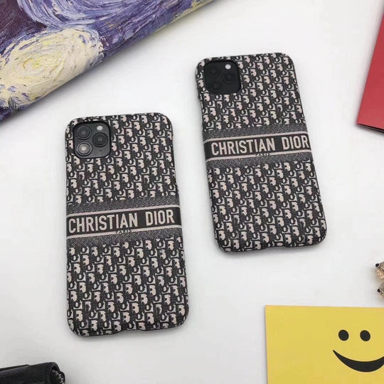 Sophisticated Dior logo gracing the high-quality exterior of the phone case