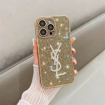 Luxury phone case by YSL featuring chic crystal design