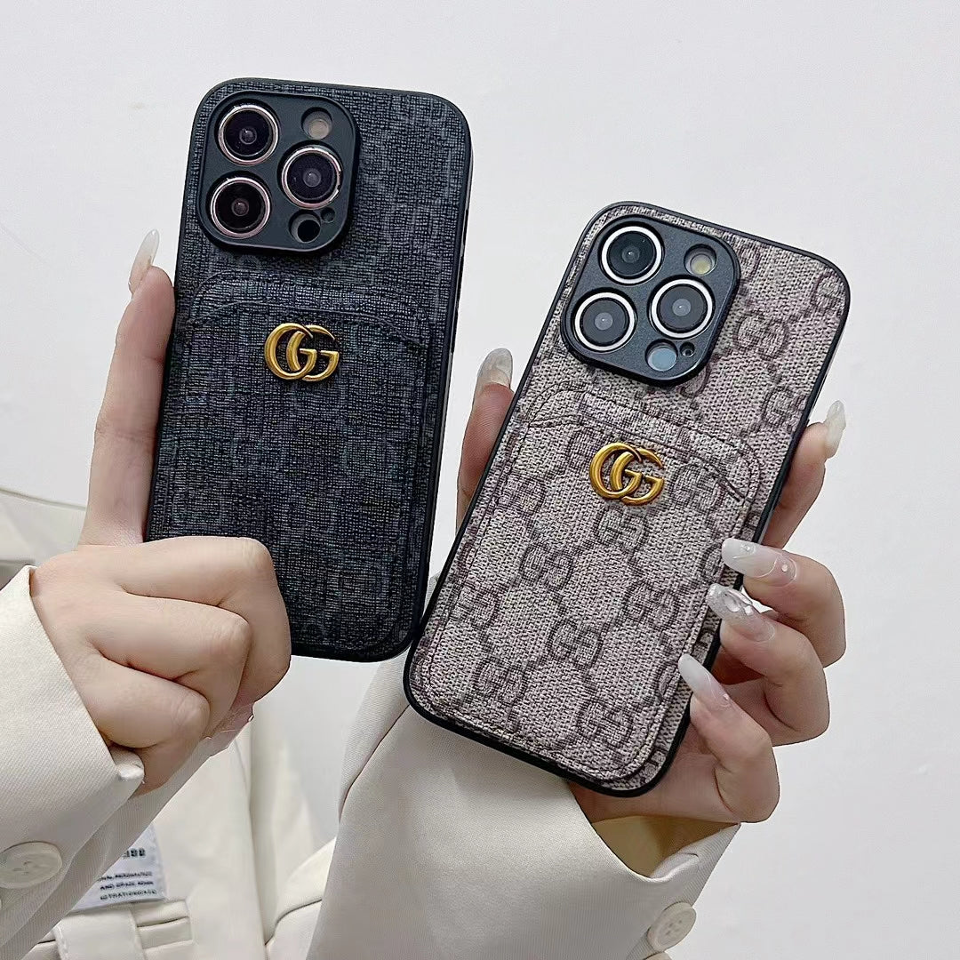 Luxurious Gucci phone case with integrated card slot, featuring GG monogram design