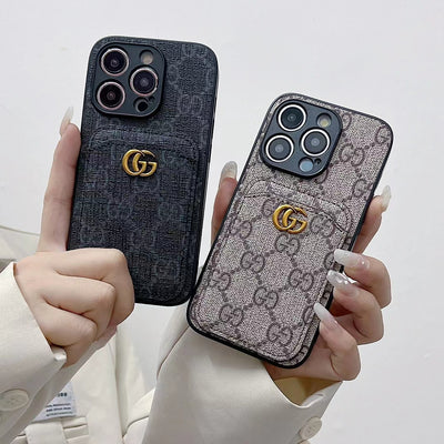 Luxurious Gucci phone case with integrated card slot, featuring GG monogram design