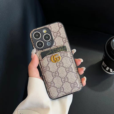 Designer Gucci phone protector with elegant card compartment, ideal for minimalists.