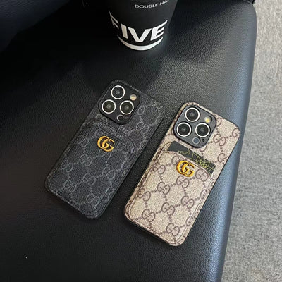 Gucci smartphone case with embedded card holder, showcasing timeless GG emblem