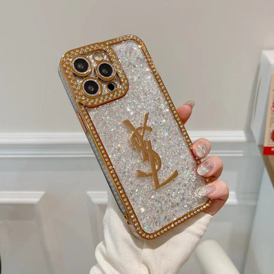 Luxury phone case by YSL with crystal embellishments