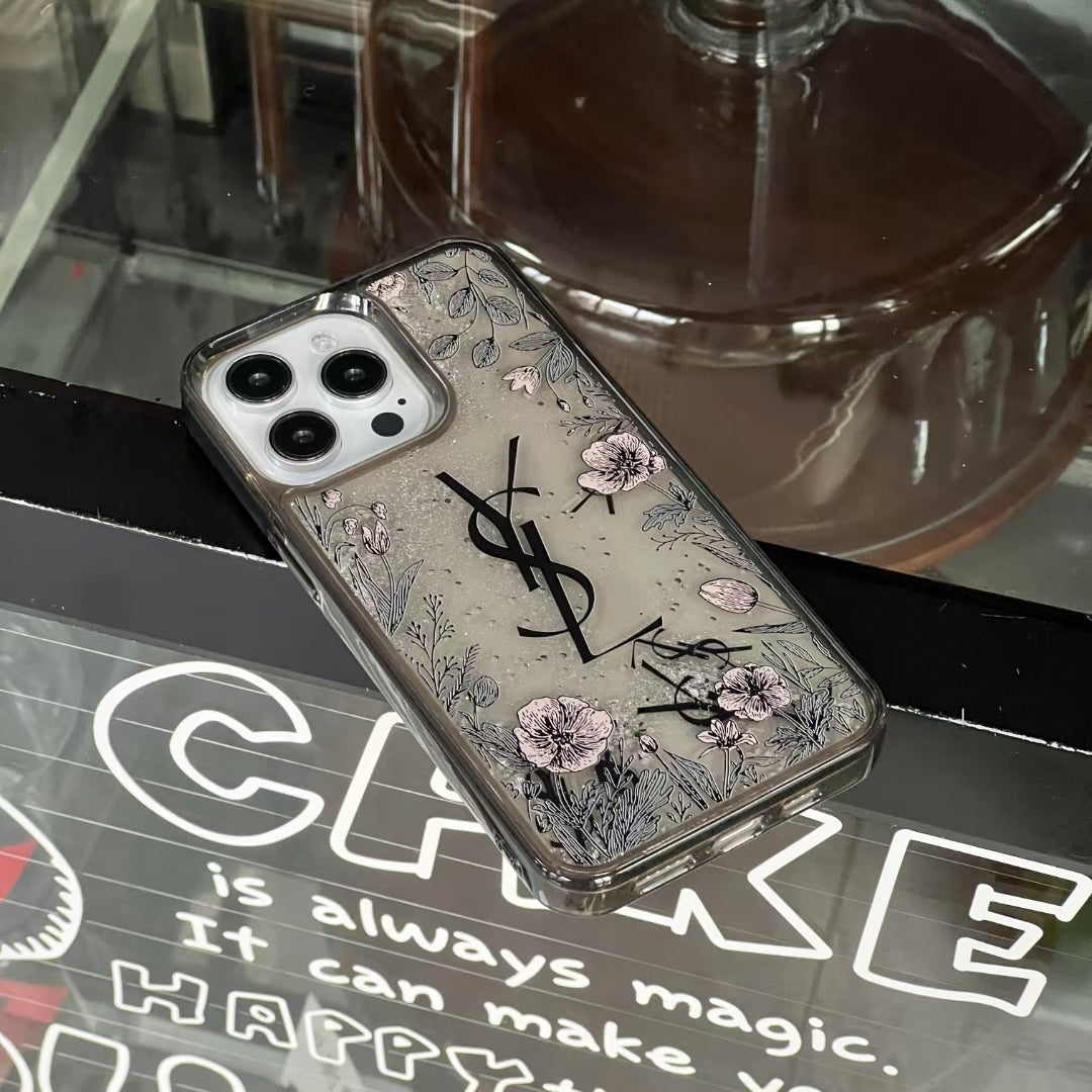 Luxury phone case by YSL featuring clear design and floral motif