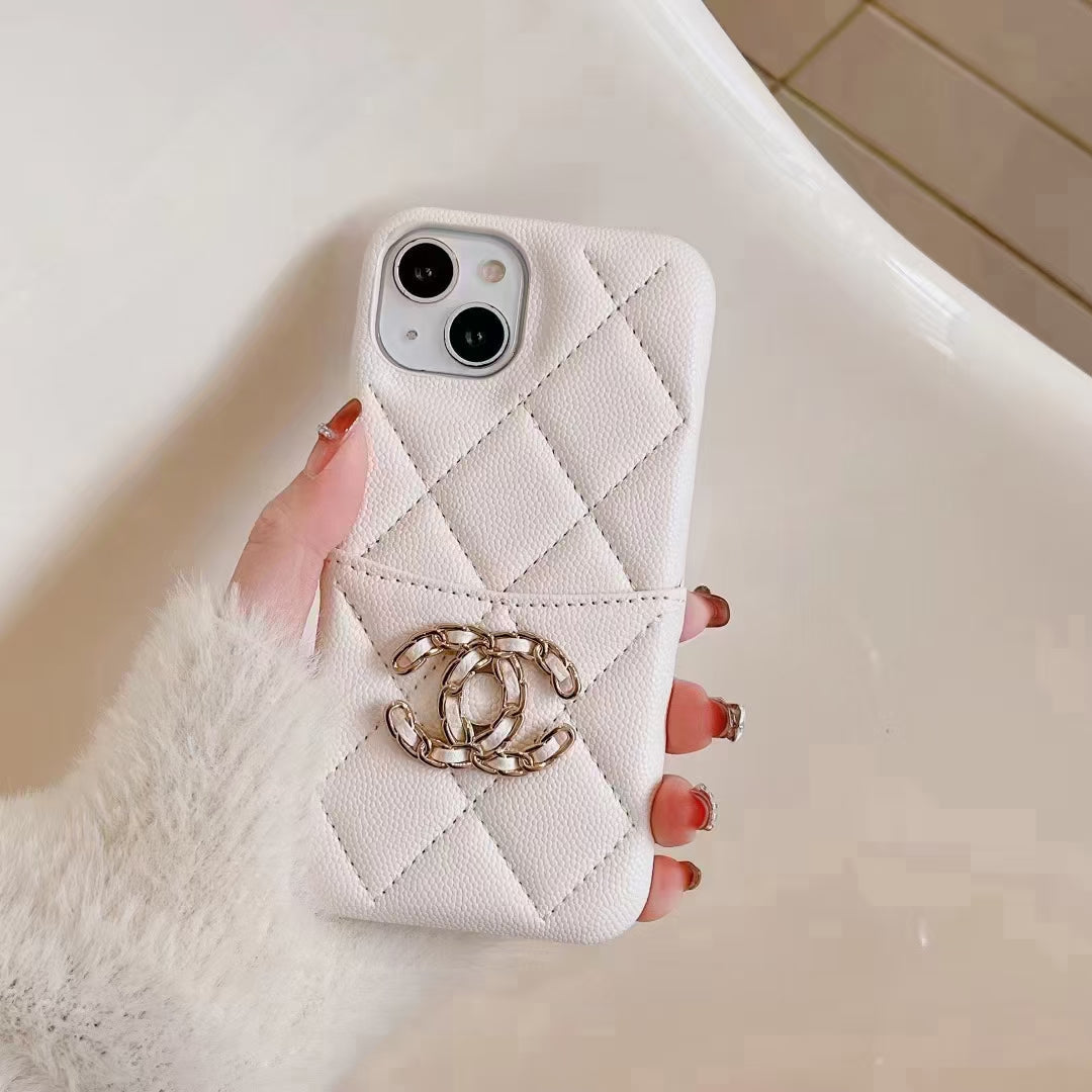 Chic Chanel iPhone Case with integrated card holder held in hand, demonstrating its stylish and practical features
