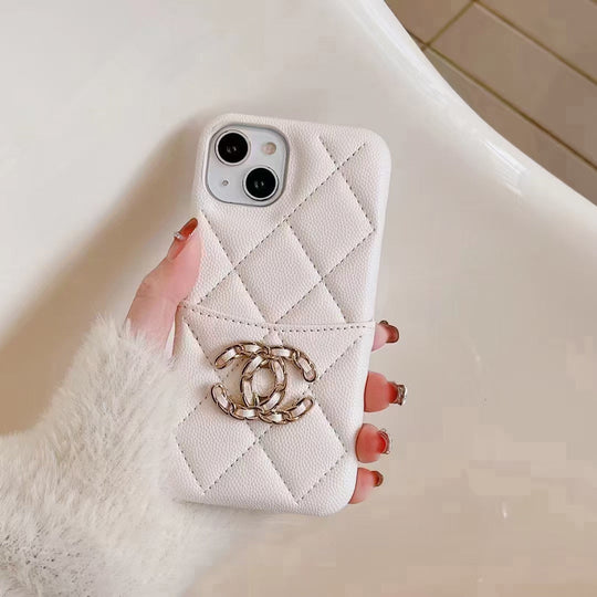 Chic Chanel iPhone Case with integrated card holder held in hand, demonstrating its stylish and practical features