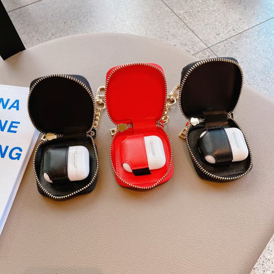 Luxury Dior AirPods Case &amp; Bag opened to reveal its interior and secure closure for AirPods