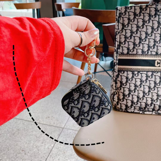 Back view of the Luxury Dior AirPods Case &amp; Bag featuring the Dior branding and premium finish