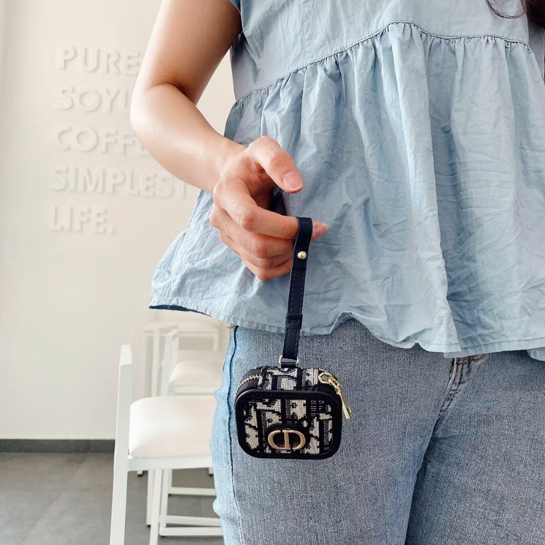 Open Dior AirPods Case &amp; Bag showing interior