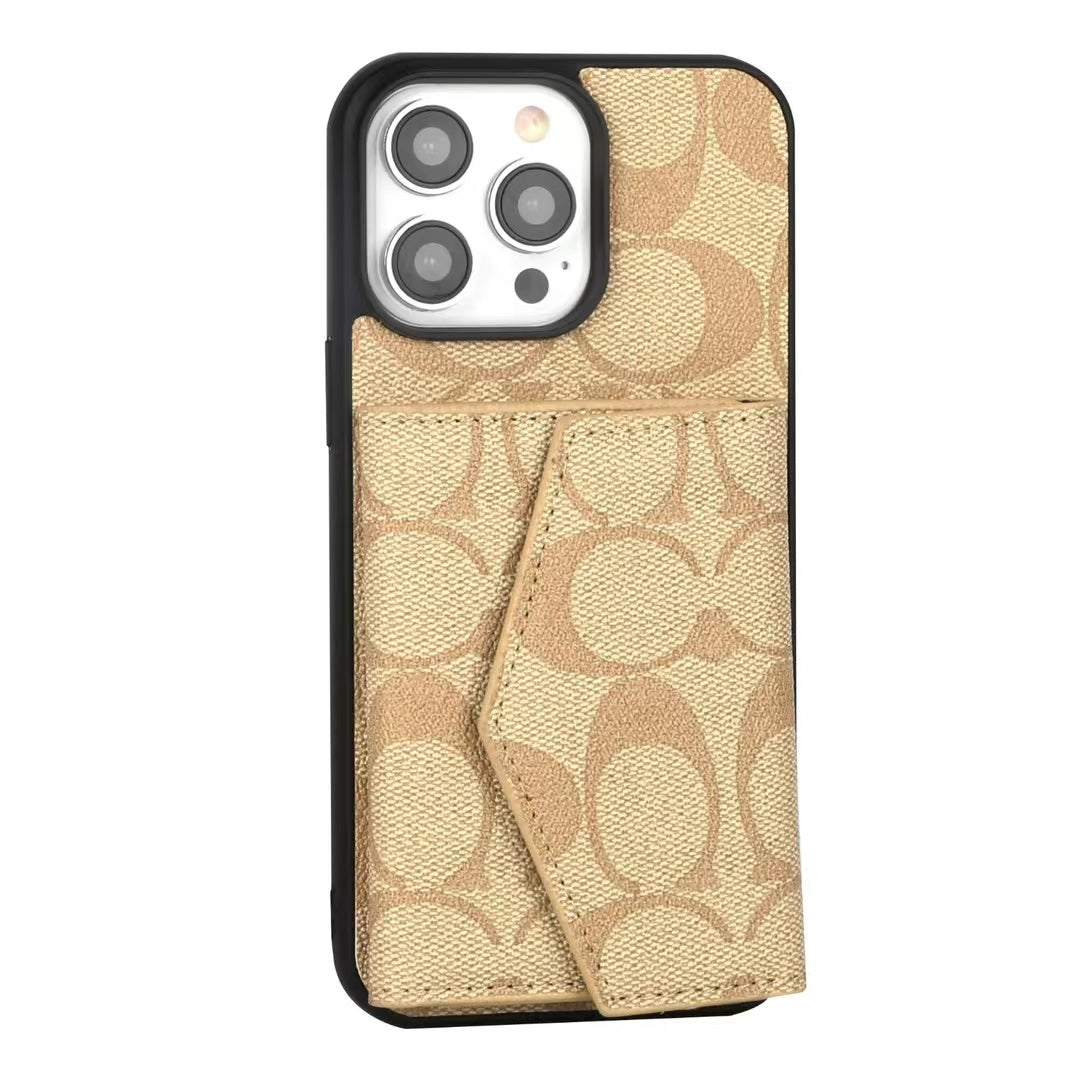 Elegant Coach iPhone Case with Wallet and Card Slots, open to reveal the iPhone inside and card storage