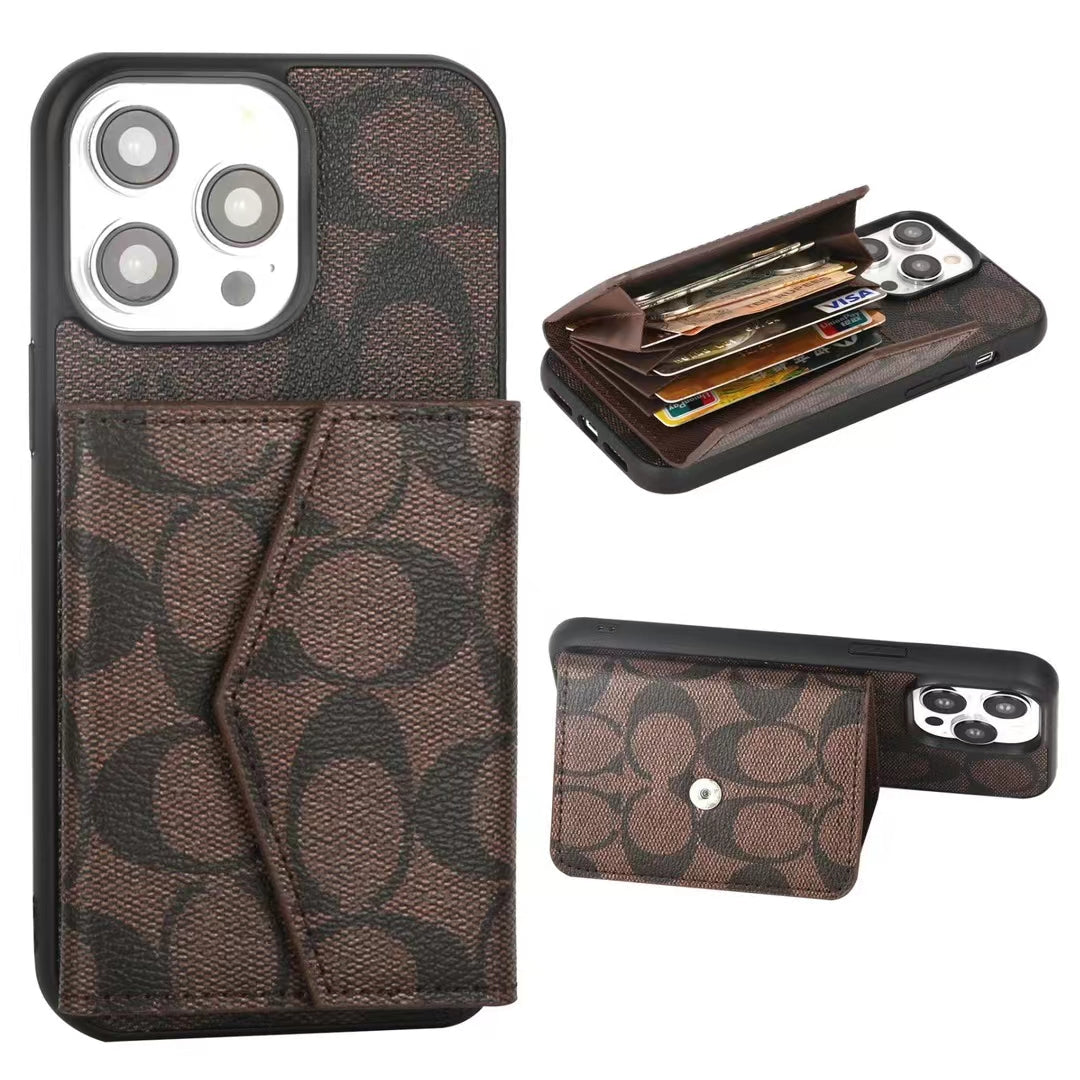 Elegant Coach iPhone Case with Wallet and Card Slots, positioned on a surface to show the sleek, modern design