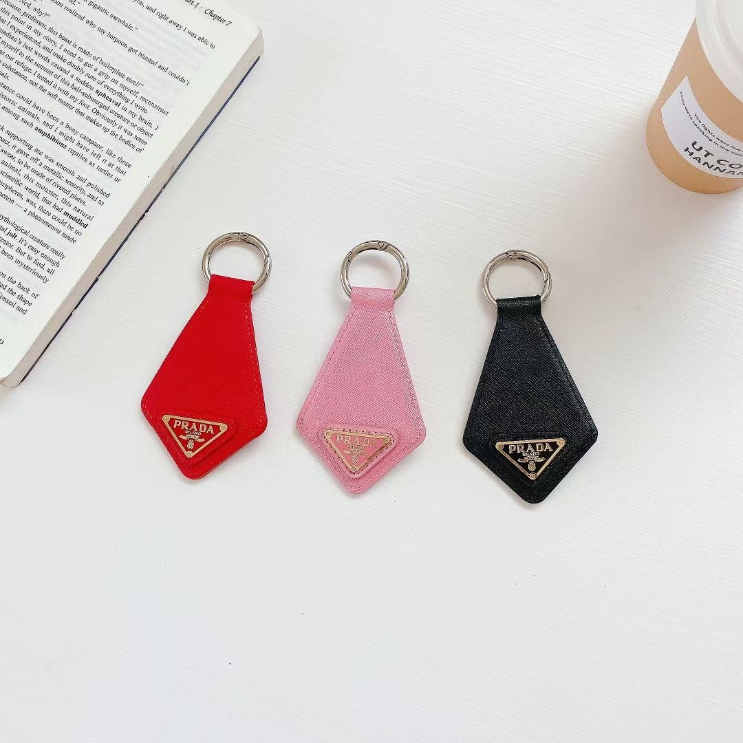 Luxury PR-Inspired AirTag Holder Keychain Collection