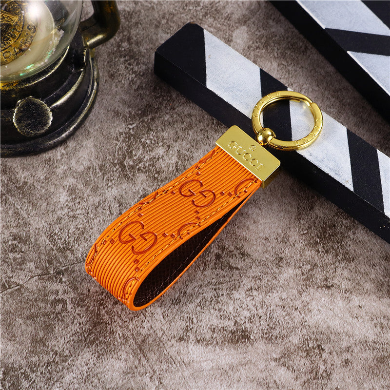 Gucci Keychain displayed on a stylish background, emphasizing its high-end craftsmanship