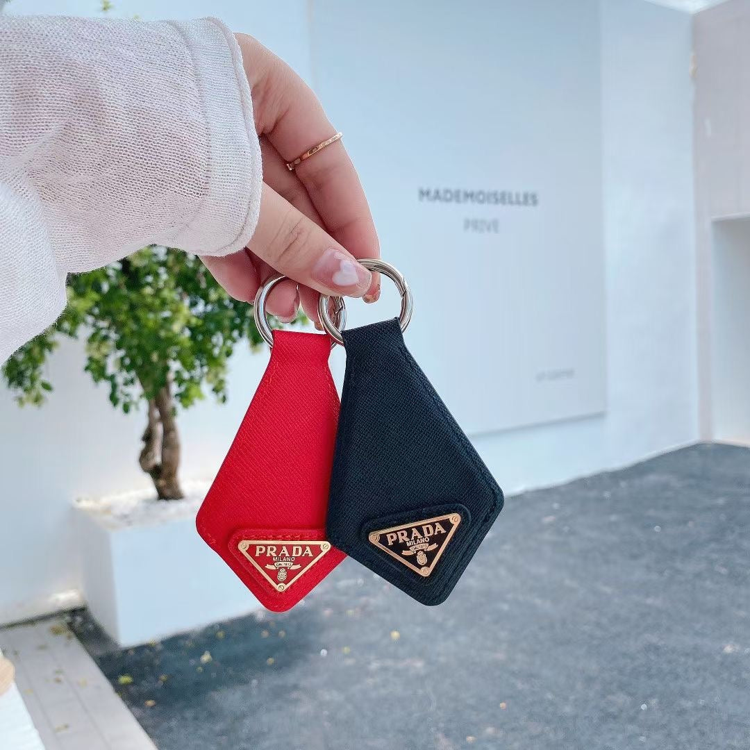 Luxury PR-Inspired AirTag Holder Keychain Collection