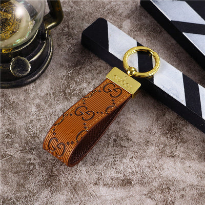 Detailed view of the Chic Gucci Keychain, showcasing its premium materials and sophisticated finish