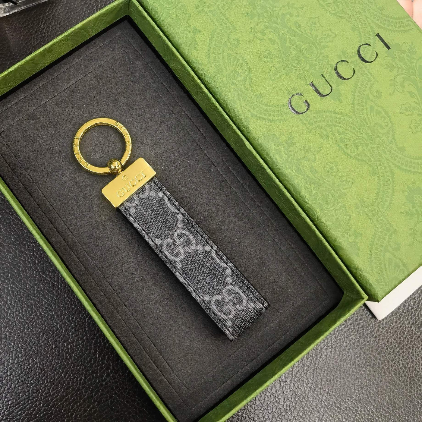 Chic Gucci Keychain with luxury design hanging from a keyring