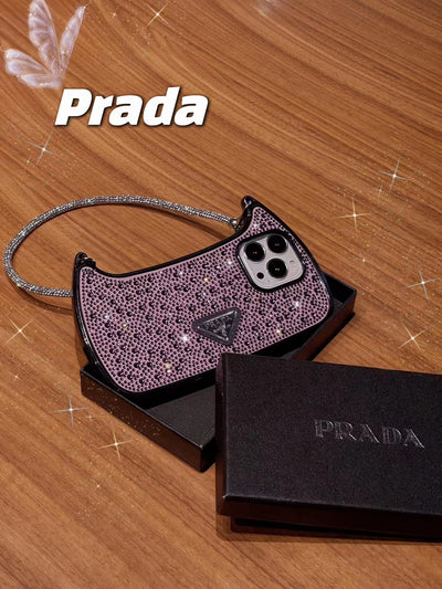 Chic Prada Phone Case with chain wrapped around wrist.