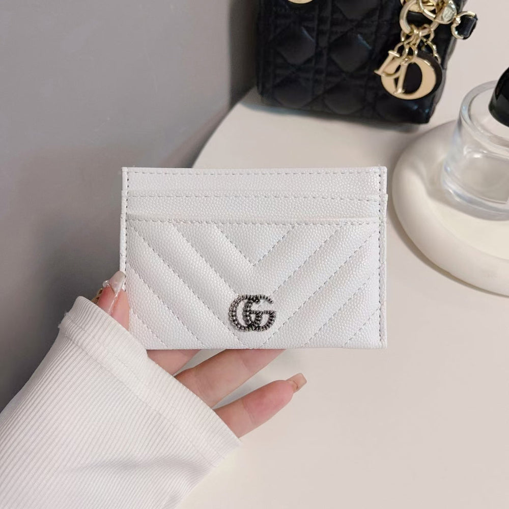 Close-up of GG monogram pattern on Classic GG Wallet