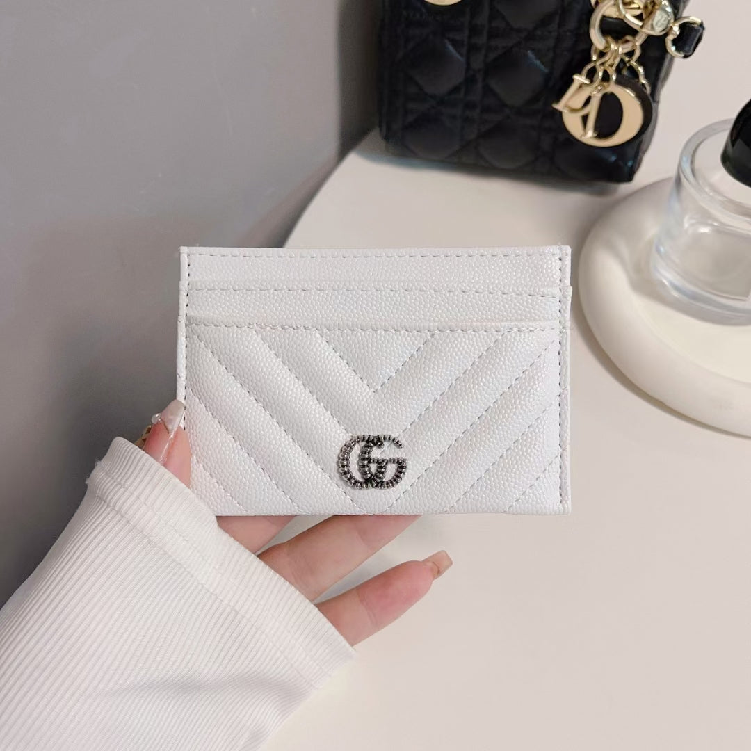 Close-up of GG monogram pattern on Classic GG Wallet