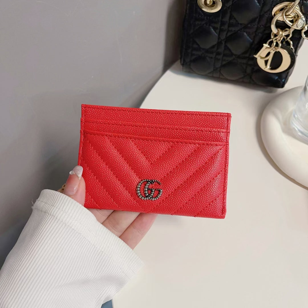 Iconic GG monogram detail on Classic GG Wallet