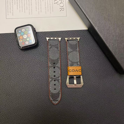 Luxury Coach Chic Apple Watch Band installed on an Apple Watch, demonstrating sleek design