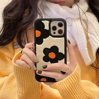 Detailed view of Embroidered iPhone Case with a soft texture, combining fashion and functionality for a trendy mobile experience.