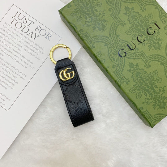 Close-up of Sleek Luxury Keychain with GG Emblem
