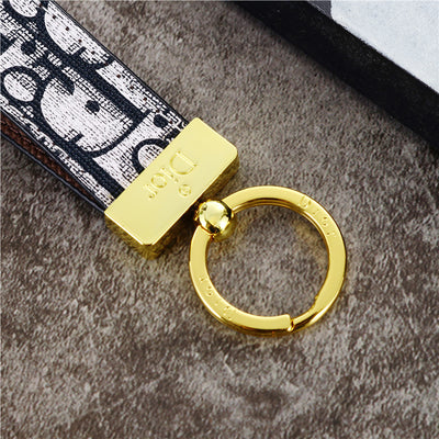 Elegant CD-Inspired Keychain Strap with Gold Accent