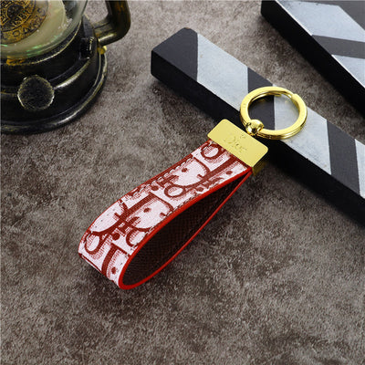 Elegant CD-Inspired Keychain Strap with Gold Accent