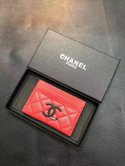 Iconic Chanel card holder featuring classic quilted pattern