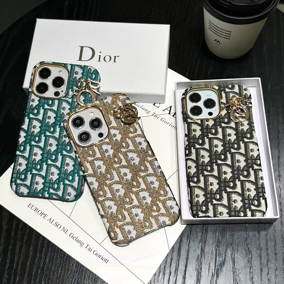 Black leather iPhone case with Dior logo and chain