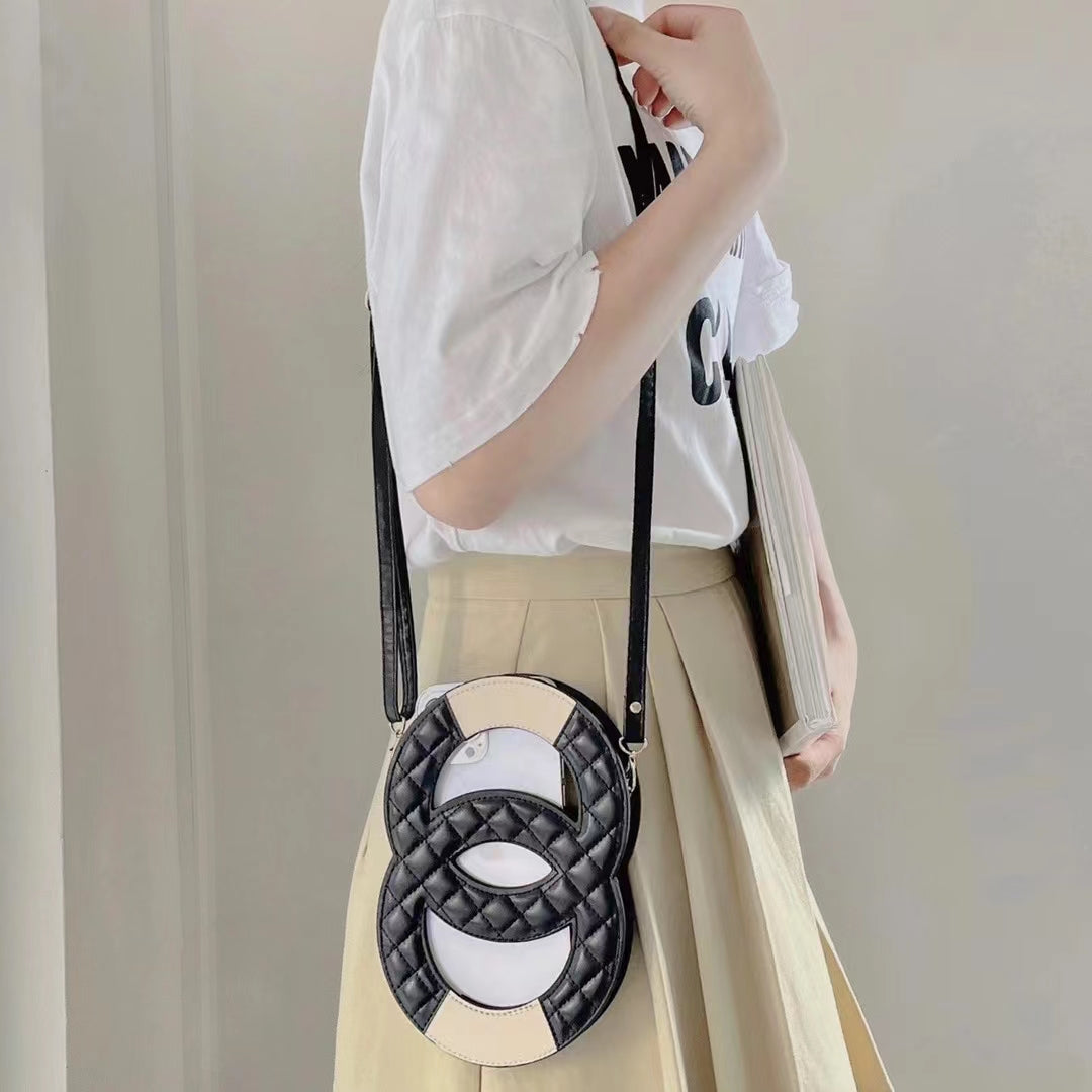 Luxury CC Crossbody Phone Bag in black, showcasing elegant design