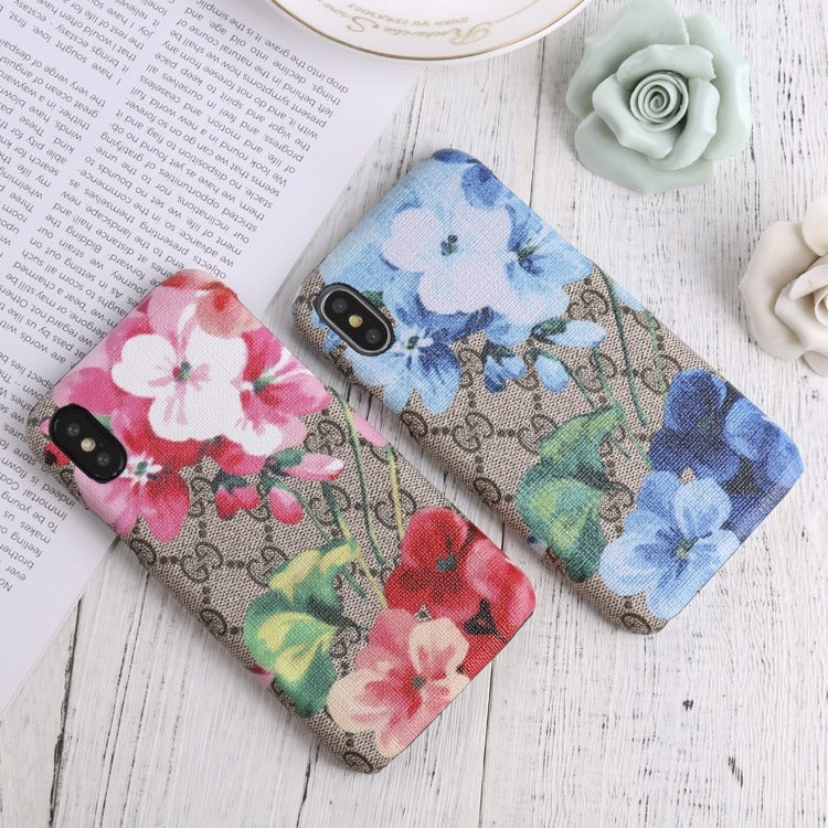 Stylish Gucci phone case with iconic blooms pattern