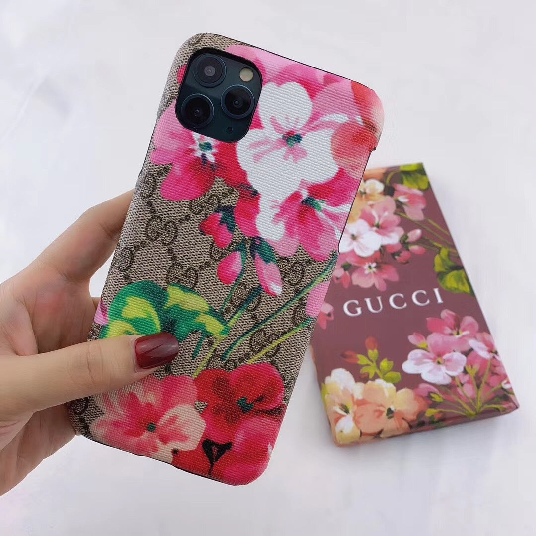 Stylish Gucci phone case with iconic blooms pattern